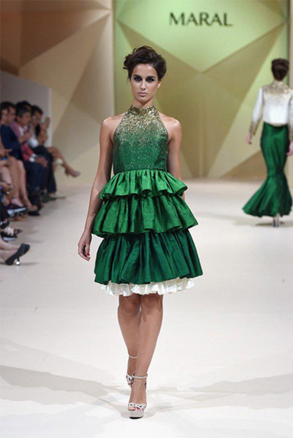 A tiered green gown on the MARAL runway
